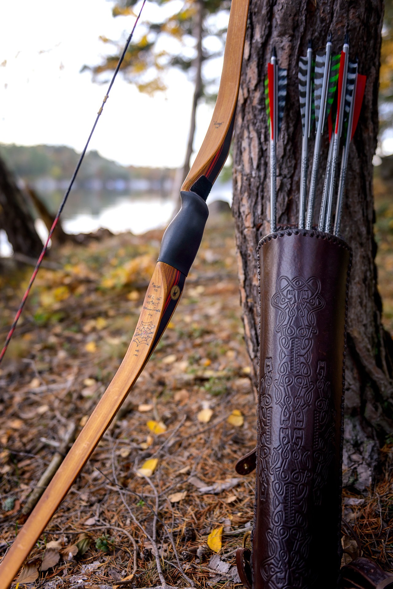 A Black Widow Longbow and a traditional quiver